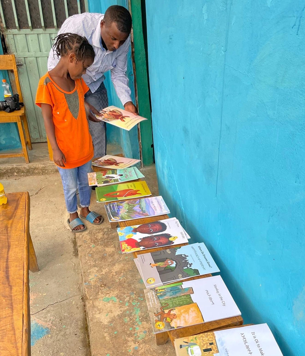 OHBD girl selecting books