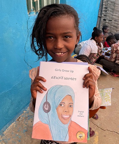 Girl Holding Book